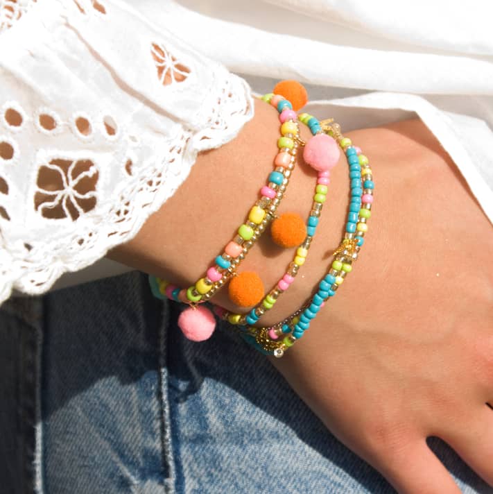 Sieraden Pompoms met gouden Oog | Div. kleuren | 10 mm | 10 st