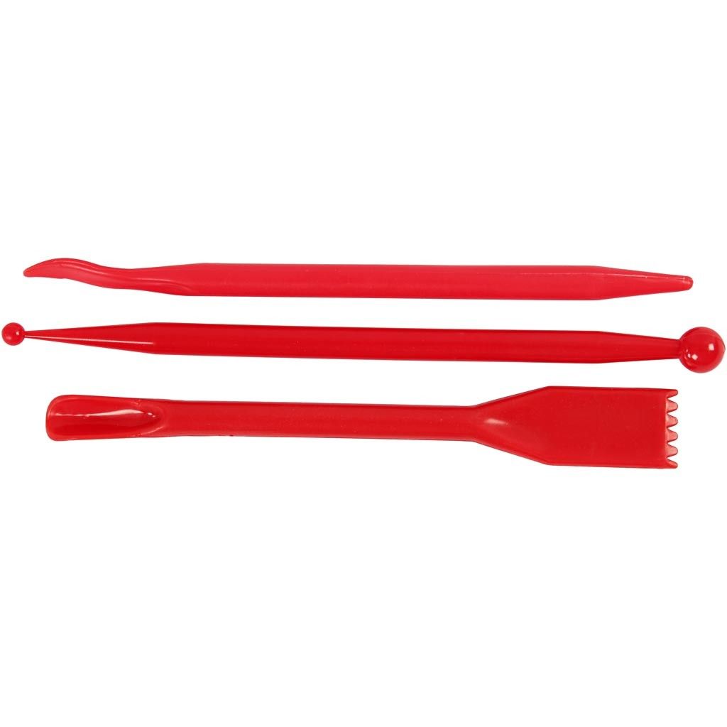 Drie rode boetseergereedschap spatels